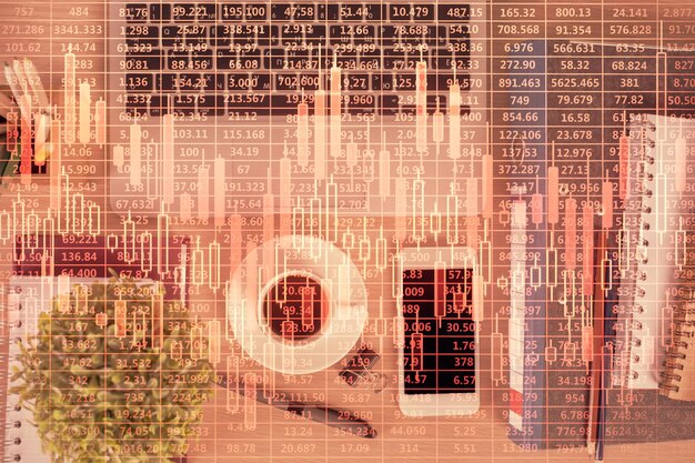 A close-up shot of a financial newspaper headline focusing on the French government's budget announcement for 2025, with graphs and charts illustrating key economic indicators.