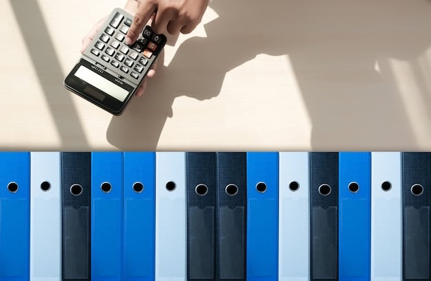 A calculator on top of a pile of tax documents, with a hand reaching to press the equals button. The scene is well-lit, suggesting focus and precision.