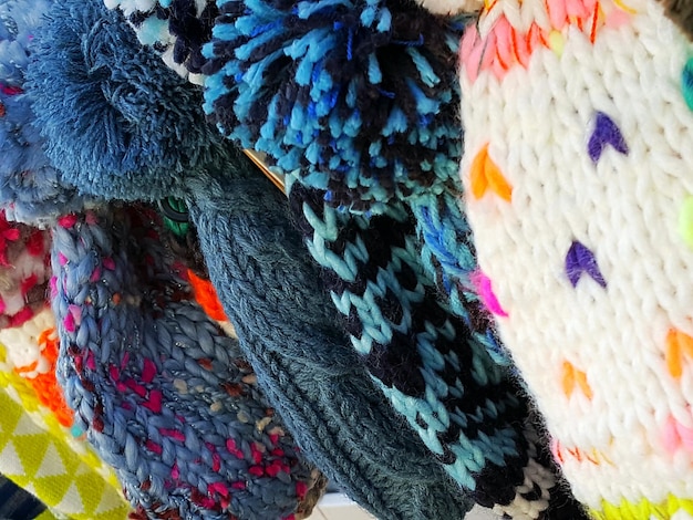 A close-up shot of various fabrics and textures that are currently trending in fashion, such as bold prints, sustainable materials, and unique embellishments.