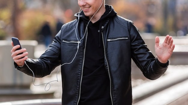 A person wearing a smart jacket that displays live health data on its sleeve. The jacket is made of a flexible, breathable fabric and incorporates sensors that monitor vital signs. The background shows a city park where the person is exercising, illustrating the practicality of wearable health technology.