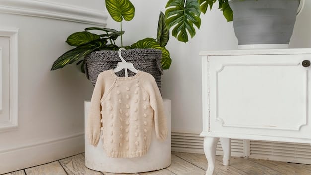 A collection of classic, well-made garments hanging in a minimalist closet. The clothes are made from natural fibers and have a timeless design.