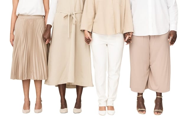 A collage of different outfits featuring loose-fitting clothing such as wide-leg trousers, oversized shirts, and flowy dresses. The background is a simple, clean white to showcase the clothes.