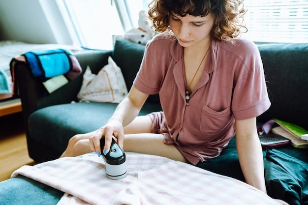 A person carefully reading the care label on a Shein garment before applying a stain removal technique. The focus is on the care instructions and the person's attention to detail.