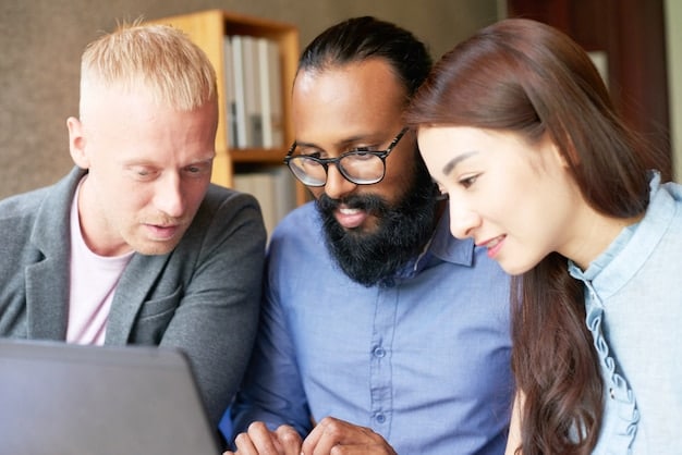 A close-up of a diverse group of entrepreneurs collaborating in a modern office space, working on their laptops and discussing business plans.