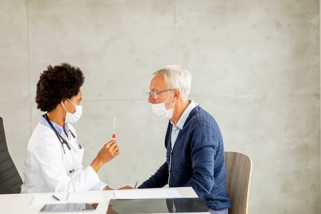 A family doctor talking to an elderly patient about vaccination recommendations, both are wearing medical face masks and looking at each other.