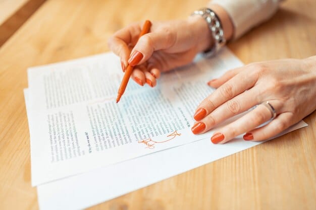 A close-up shot of a student meticulously reviewing their resume with a pen in hand, highlighting the importance of attention to detail and preparation.