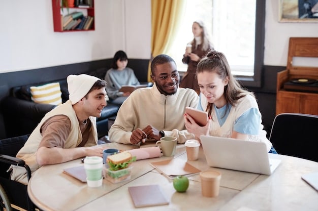 An indoor shot of a diverse group of students collaborating on a project during an apprenticeship program in a modern classroom setting, with laptops and learning materials surrounding them. The atmosphere is collaborative and engaging, representing hands-on experience.