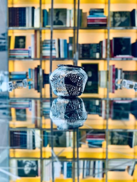 A shelf full of books in a library, symbolizing traditional sources of knowledge and the importance of research in continuing education.