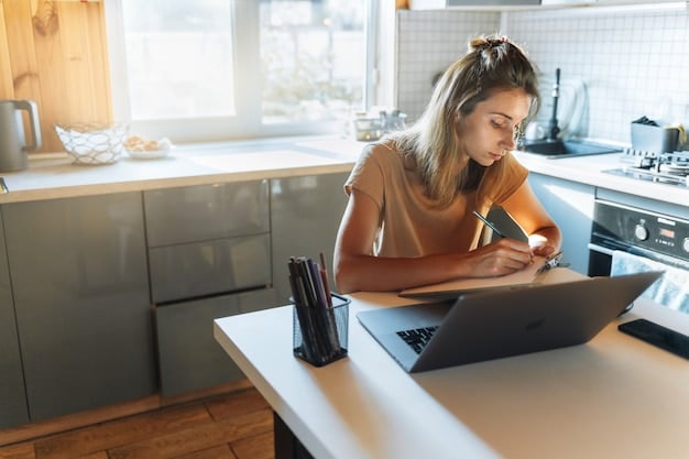 A person filling out a government assistance application form on a laptop at their kitchen table, with a cup of coffee and some bills nearby. The scene is realistic and shows the process of applying for financial aid.