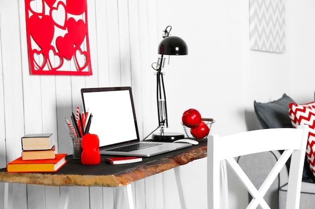 A bright and modern living space with a desk, laptop, and books, representing a comfortable study area.