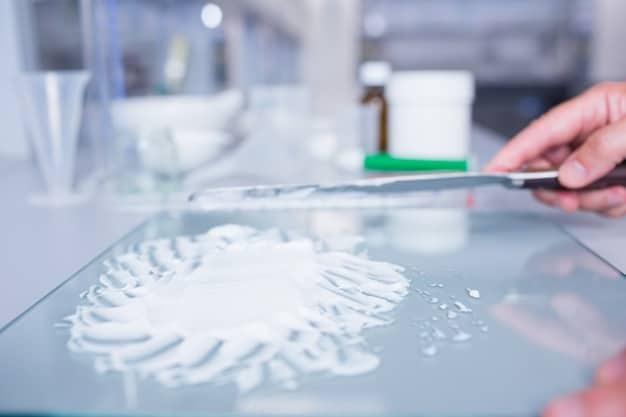 A close-up shot of a lab technician examining a fabric sample made from recycled plastic bottles. The background shows various stages of the recycling process, highlighting the transformation from waste to sustainable material.