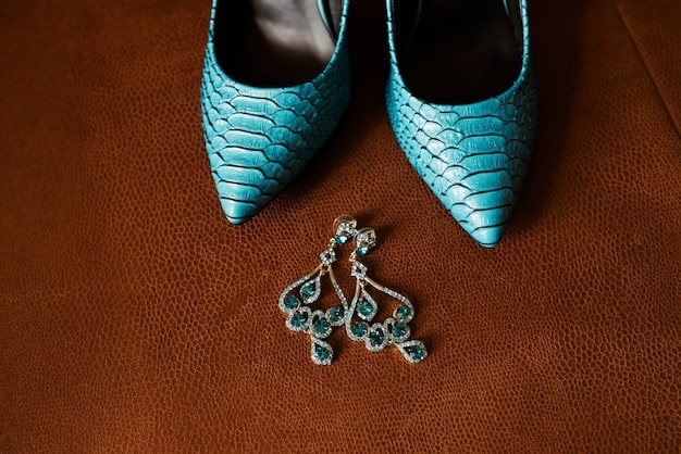 A close-up shot of various accessories, including elegant heels, a clutch purse, and statement jewelry like a necklace and earrings.