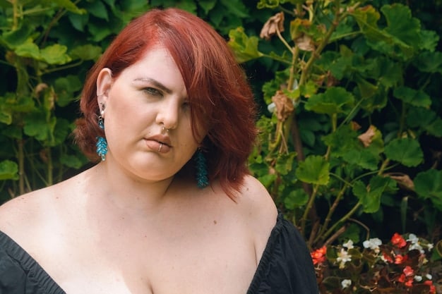 A close-up shot of a plus-size woman wearing a statement necklace, delicate earrings, and stylish glasses. Her hair is neatly styled, and her makeup is natural and polished. The background is blurred to keep the focus on the accessories.